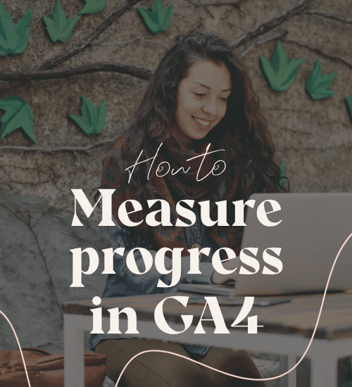 Female using laptop, measuring SEO in GA4